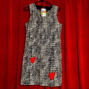 Sexy and cute, black & white mini dress with red heart cut out detail